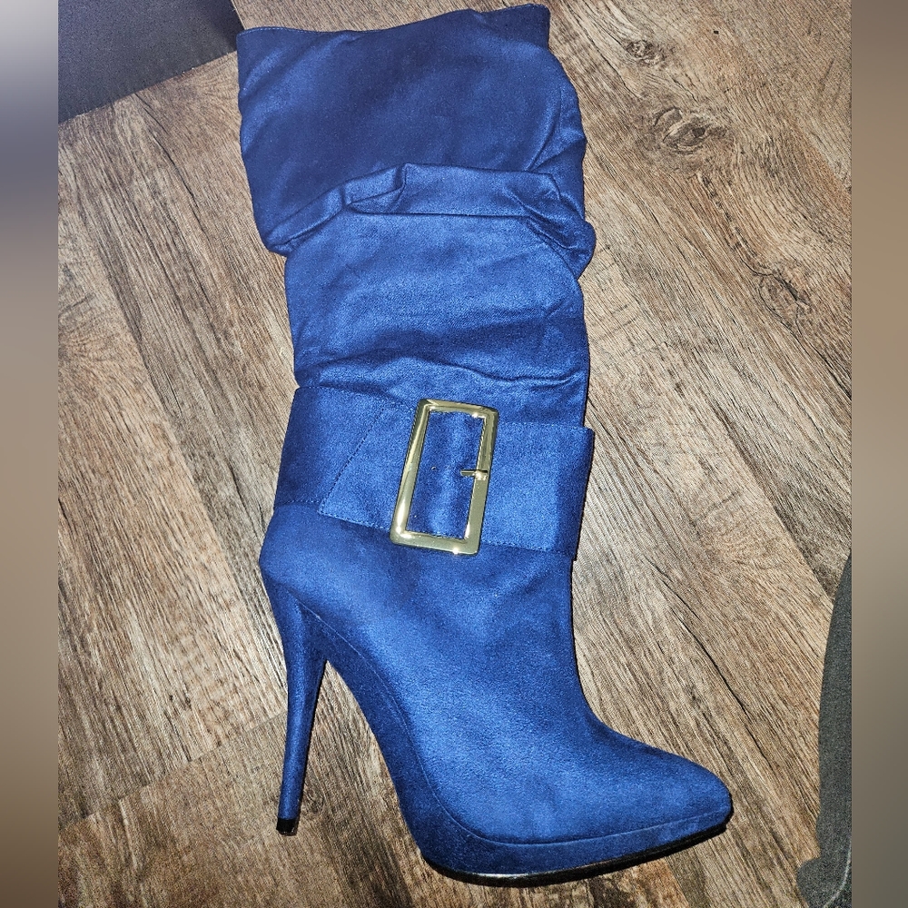 Blue knee high heeled dress boots